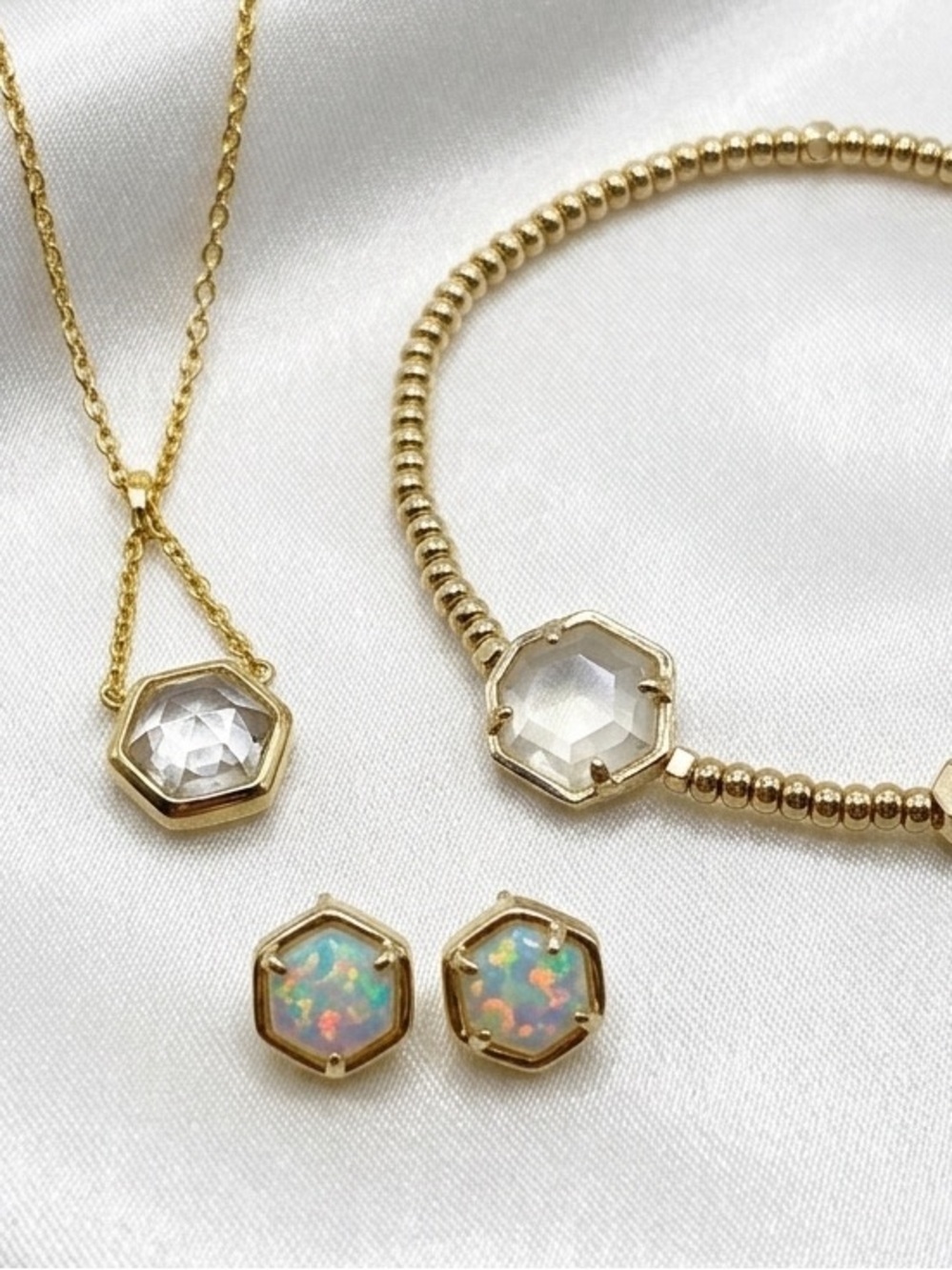 Kendra Scott three piece opal set old-necklace, earrings and bracelet